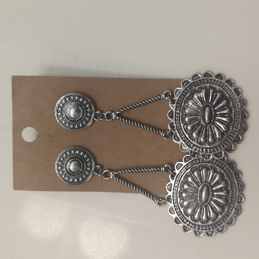 Silver, dangle earrings from Dallas TX